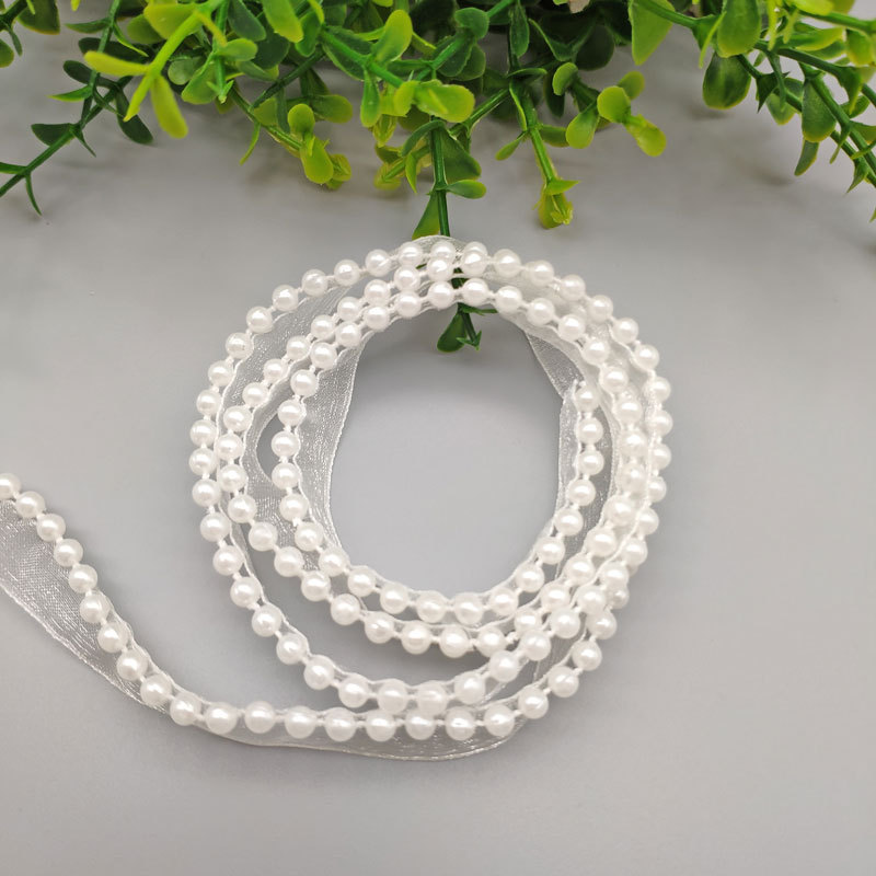 Description Picture 3 of item5Meters/Lot 1.2cm Chiffon Lace Ribbon with Fake Pearl DIY Apparel Sewing & Fabric Beaded White Lace Trimming Garment Tape