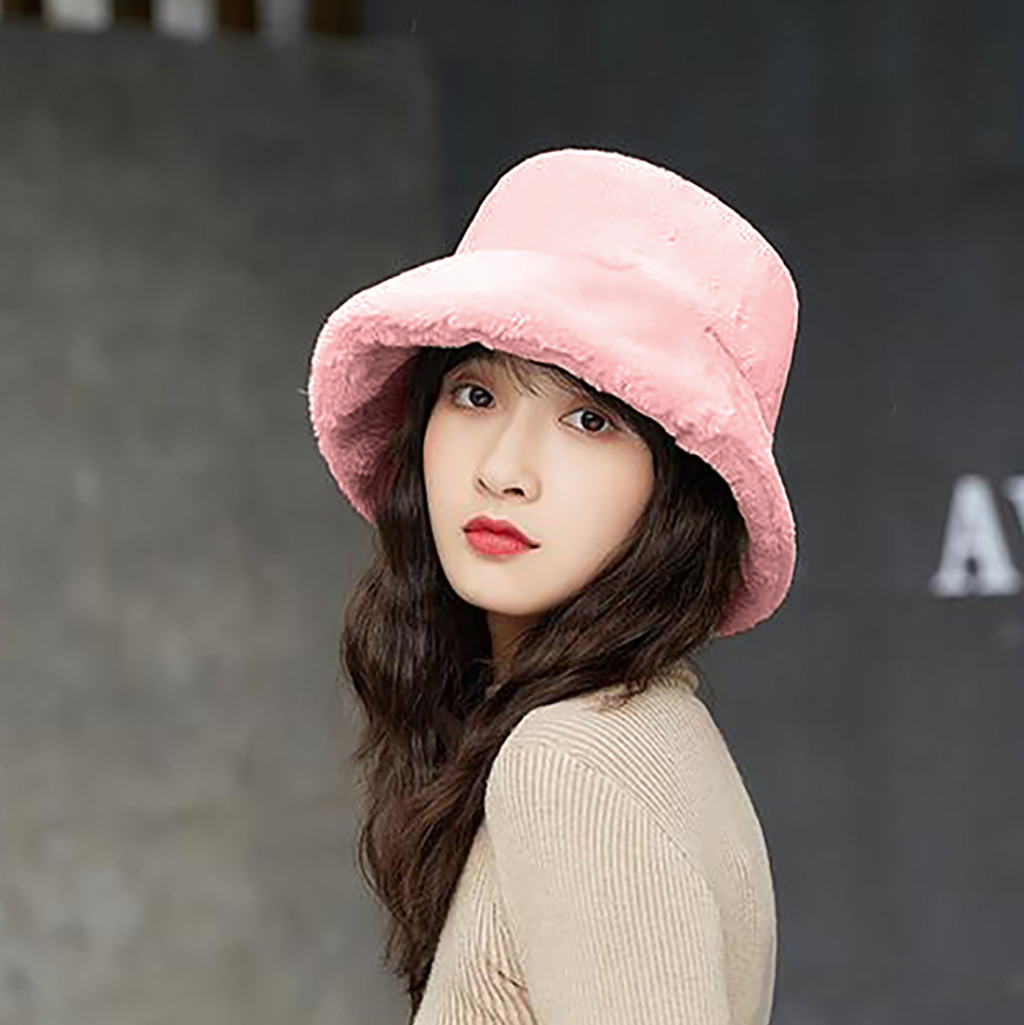 women in bucket hats