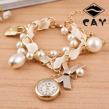 Shipping caliente de moda mujeres pulsera relojes Lady tecla de bloqueo de aleación de la perla de la mariposa para mujer del reloj de cuarzo de la cinta de pulsera