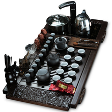 Kung fu tea yixing tea set four in one induction cooker solid wood tea tray