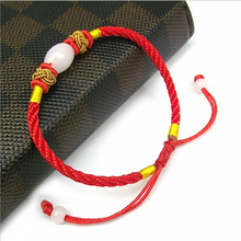2015 New!! Hand-woven imitation jade Transshipment beads Red string Bracelet in Ms. national wind fashion hand rope YX-B36