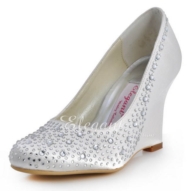 ivory round toe pumps