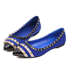 A new Europe on behalf of summer with flat pointed shoes spell color rivet sleeve flat