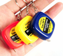 Venta al por mayor hogar creativo vida cotidiana llavero 1 metro cinta métrica de mini portátiles dos yuanes tienda de venta