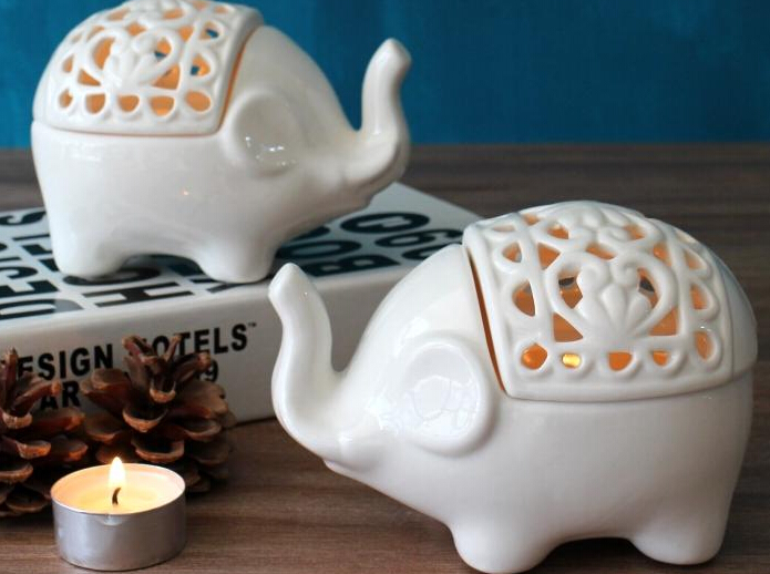 Compra candelabros elefante online al por mayor de china ...