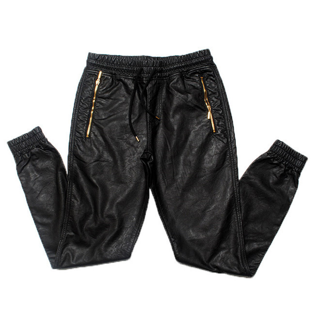 black joggers with gold zippers