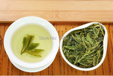 Mingqian premium 2014 spring new tea Westlake Longjing tea chinese green tea whitening send fire Jar