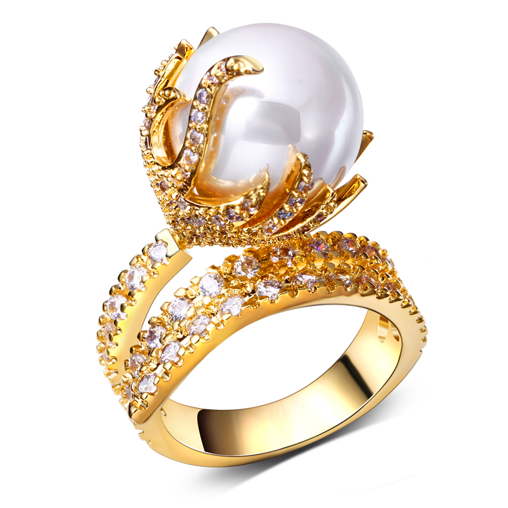 Golden pearl engagement rings