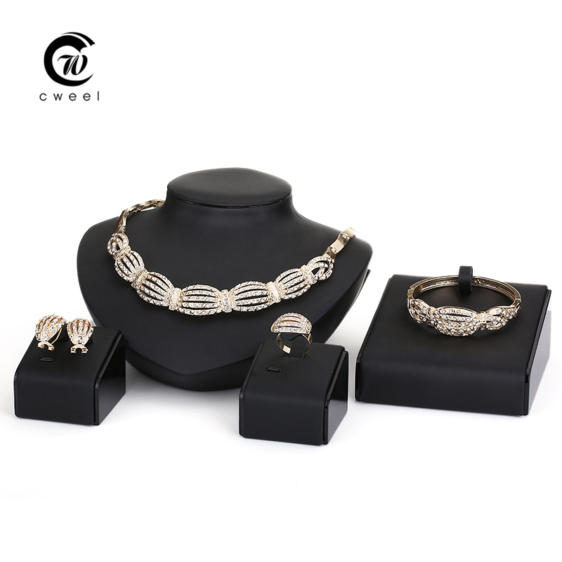 http://g02.a.alicdn.com/kf/HTB1IFUTGXXXXXaEapXXq6xXFXXXY/Jewelry-Sets-Fine-African-Beads-Necklace-Bracelet-Earrings-Rings-Set-Crystal-CZ-Diamond-Wedding-Gold-Plated.jpg