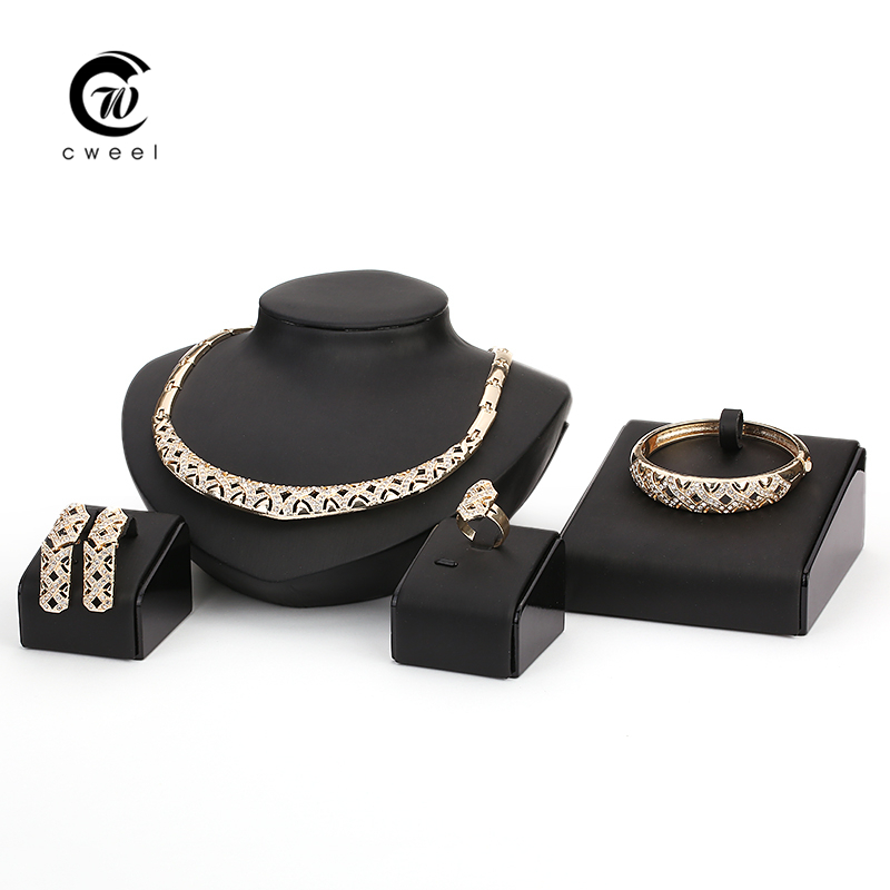http://g02.a.alicdn.com/kf/HTB1JvgYGXXXXXaRaXXXq6xXFXXX7/Fine-Jewelry-Sets-Women-Wedding-Accessories-African-Beads-Gold-Plated-CZ-Diamond-Bridal-Necklace-Bracelet-Earrings.jpg