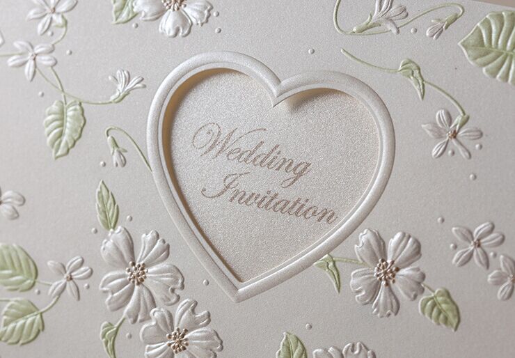 Vintage embossed wedding invitations