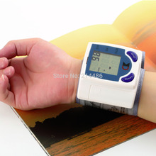 Digital LCD Wrist Blood Pressure Monitor With Heart Beat Rate Pulse Measure