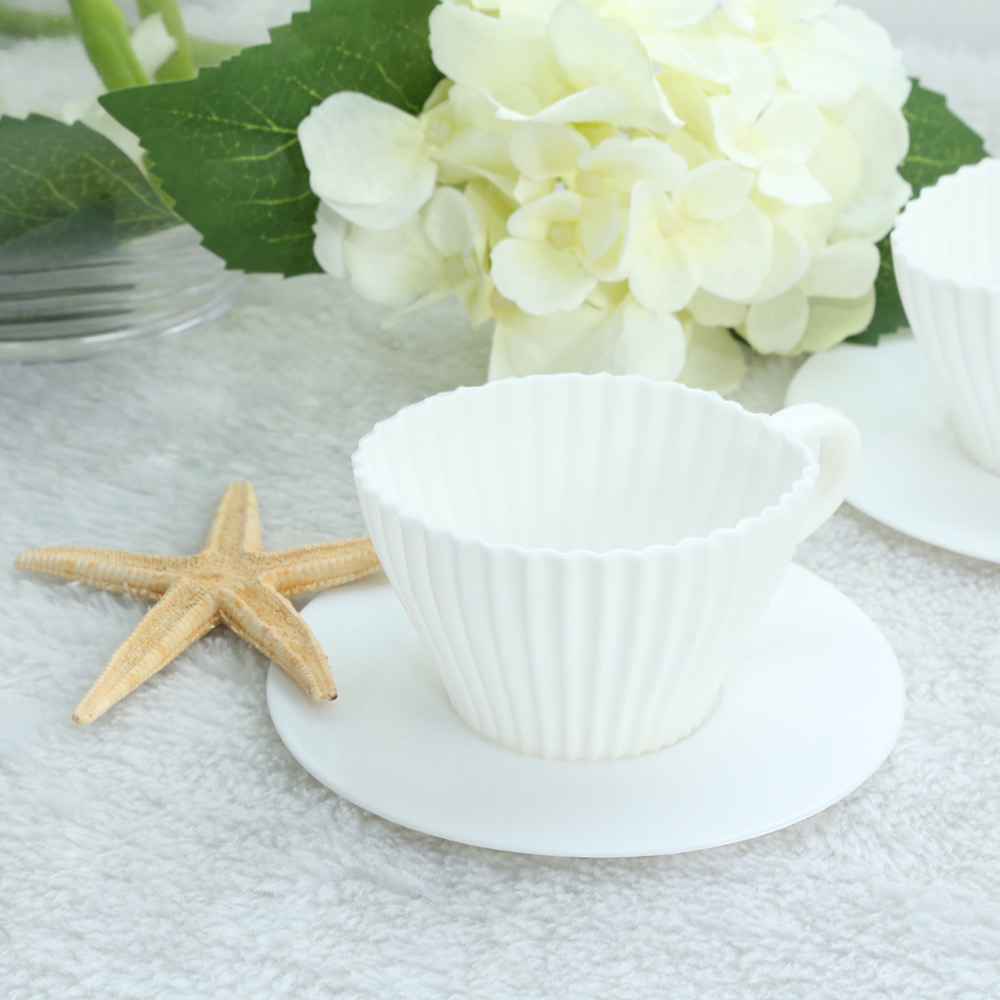 plastic tea cups with saucers