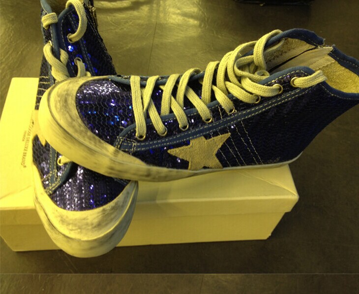 golden goose superstar arancione