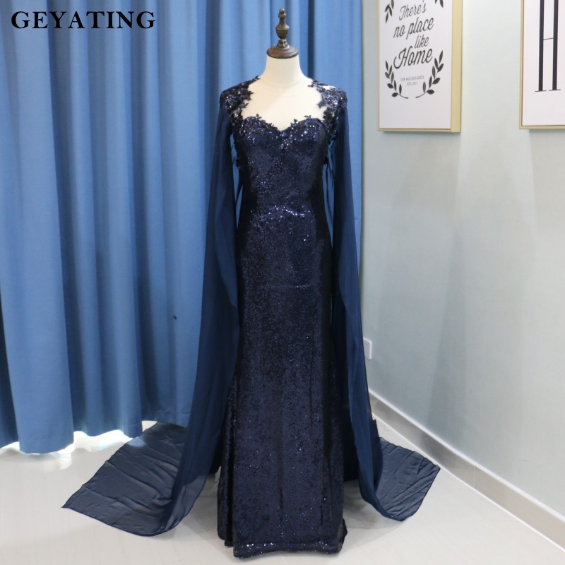 navy blue dress with cape