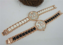 Para mujer de la marca Rhinestone relojes de lujo Crystal Rose Expoxy Band mujeres del reloj para mujer de moda los relojes del cuarzo