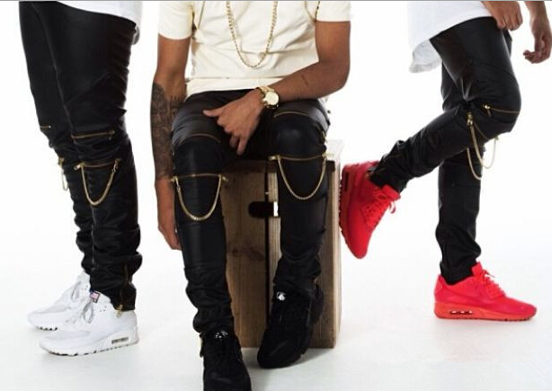 black leather joggers with gold zippers