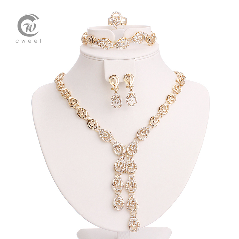 http://g02.a.alicdn.com/kf/HTB1TK8TIFXXXXazXpXXq6xXFXXXD/Cweel-African-Beads-Jewelry-Sets-For-Women-Necklace-Earrings-Bracelet-Rings-Set-Wedding-Party-Gold-Plated.jpg