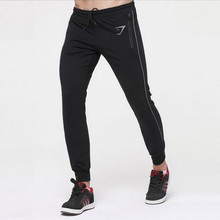 2016 gym clothing Tracksuit Bottoms Cotton Elastic Mens Joggers sport trousers Bodybuilding men Pants Outdoor jogging Sweatpants
