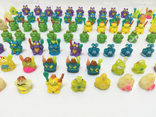 100 pcs/lot Colorful cartoon anime action figure toy2-3cm, PVC soft garbage trash pack model toys