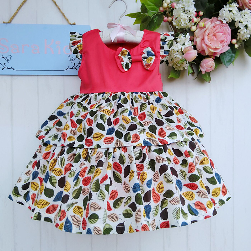Wholesale fashion design floral print series ball gown dress party dress with bowknot short sleeved girls dress 2014905