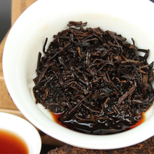 Yunnan big leaves drying green tea Maocha court Chazhuan 250 g cooked brick tea Specials