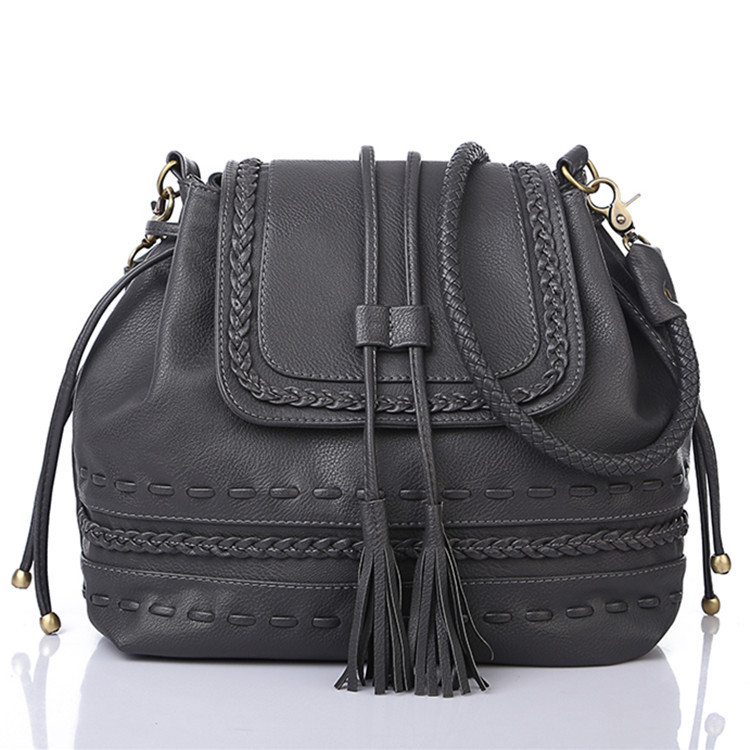 2015 causal Large capacity bucket bag the influx of new handbags fringed retro shoulder women s
