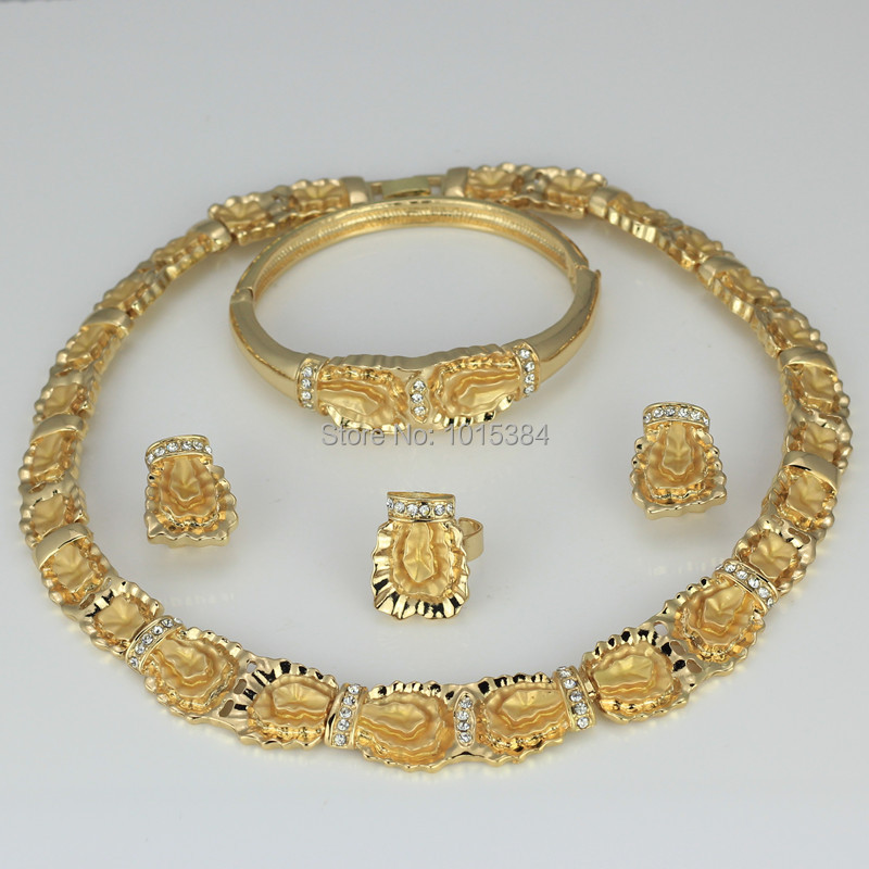 http://g02.a.alicdn.com/kf/HTB1go7.HVXXXXcXXVXXq6xXFXXXs/2015-specail-fashion-jewelry-set-necklace-ring-earrings-bangle-set-dubai-african-jewelry-sets-fashion-yellow.jpg