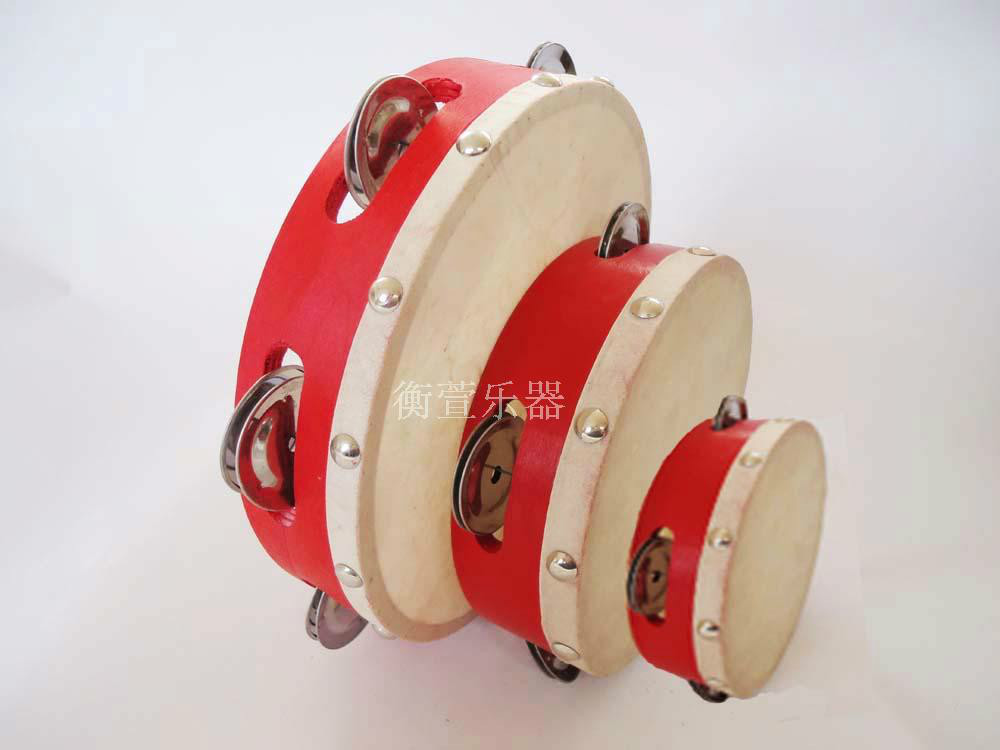 Nursery school children hand clap percussion tambourine dance propsin