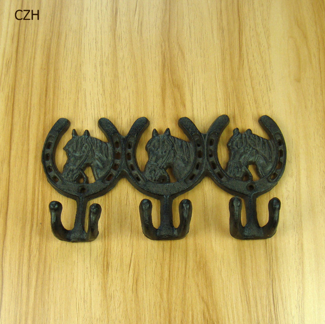 Vintage hierro fundido ropa con estampado de caballo gancho hecho a