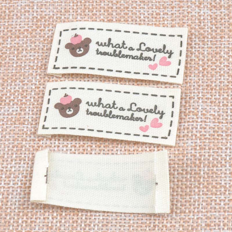 Description Picture 4 of item50pcs Beige Woven Labels For Clothing Care Labels Cartoon Bear Woven Labels Clothing Shoes Bags Washable Garment Tags CP1532