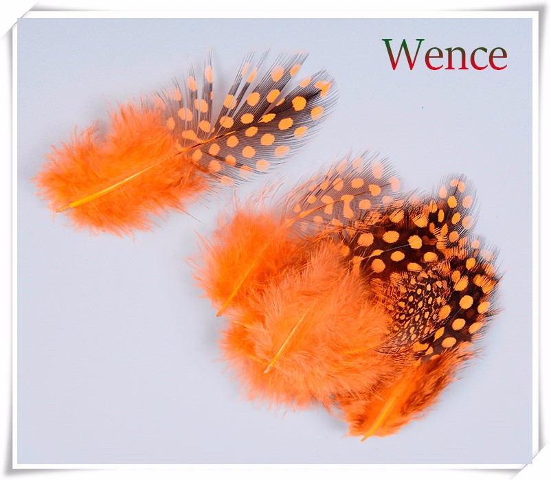 750.650 Guinea feather orange