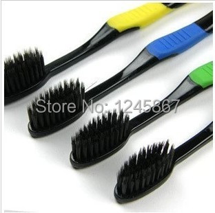 Nano toothbrush black charcoal toothbrush four loaded (1).jpg