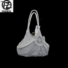 woman bag 2016 material is a high quality faux leather zipper is nylon