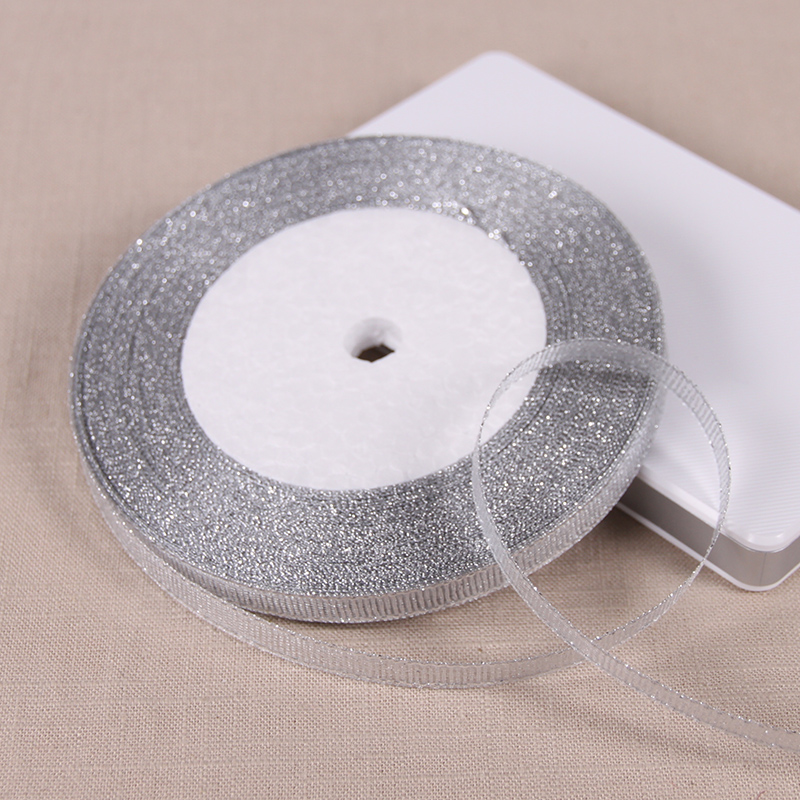 Description Picture 3 of item25Yards 6mm Silver Gold Glitter Silk Satin Ribbon Party Home Wedding Decoration Gift Wrapping Christmas Halloween DIY Material