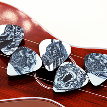10PCS 0.71mm high quality guitar picks two side pick Black and white animal picks earrings DIY Mix picks guitar