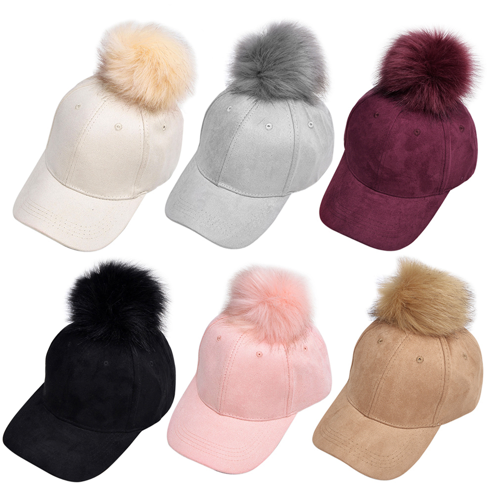 baseball cap with fur pom pom