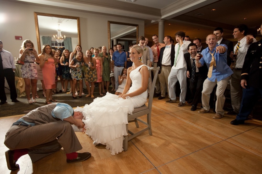 pink-gray-wedding-garter-removal