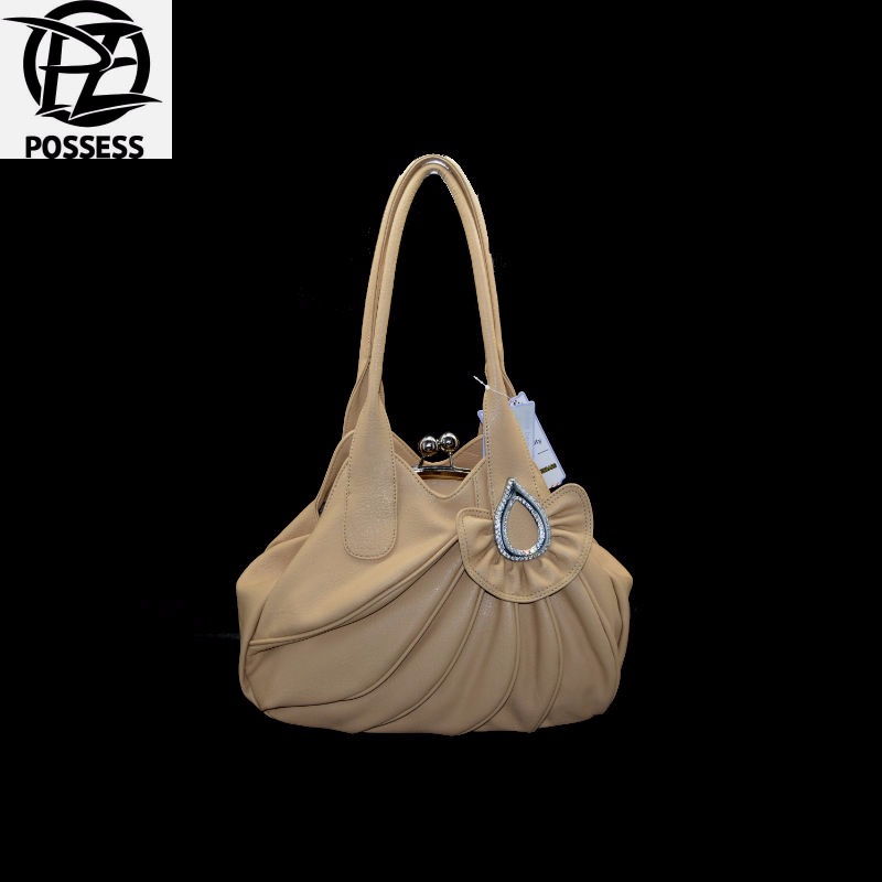 woman bag 2016 material is a high quality faux leather zipper is nylon