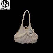 woman bag 2016 material is a high quality faux leather zipper is nylon
