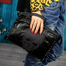 Free shipping Pure sheepskin hand bag shoulder bag skull head rivet hand bag personality one shoulder aslant leather handbag