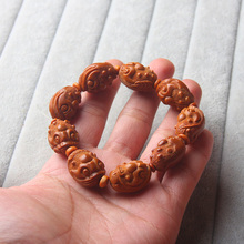 FREE SHIPPING China’s traditional arts and crafts WOMEN&MEN Hand string olive bracelet original seeds Carved Dragon totem